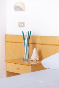 Postel nebo postele na pokoji v ubytování Hotel Katina