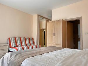 Postel nebo postele na pokoji v ubytování ApartHotel Belvedere Residence Becici Budva