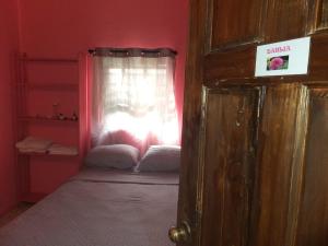 Postel nebo postele na pokoji v ubytování The Cherry Blossom House + 4 fotografie