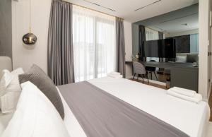 Postel nebo postele na pokoji v ubytování Hotel Teuta + 37 fotografií