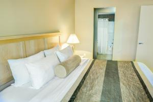 Voodi või voodid majutusasutuse Clearwater Hotel Ltd toas