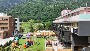 an aerial view of an amusement park with a playground at Ravelli Sporting in Mezzana