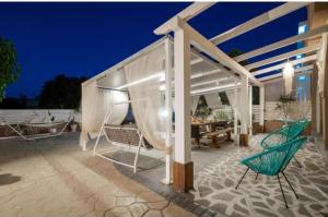 A patio or other outdoor area at Casa D'Oro Exclusive Villa