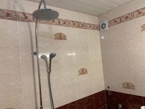 Koupelna v ubytování Rony Hotel