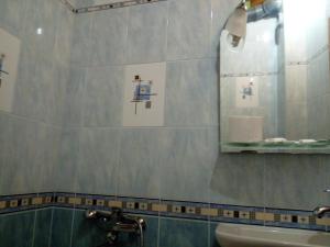 Koupelna v ubytování Rony Hotel