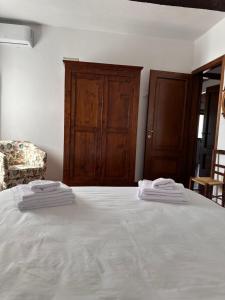 Postel nebo postele na pokoji v ubytování Cascina Bella Relais