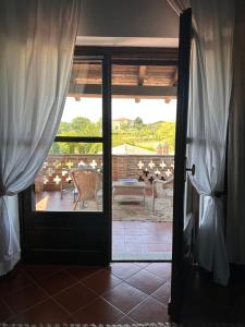 Balkón nebo terasa v ubytování Cascina Bella Relais