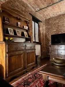 TV a/nebo společenská místnost v ubytování Cascina Bella Relais