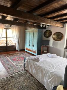 Postel nebo postele na pokoji v ubytování Cascina Bella Relais