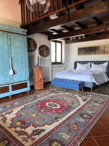 Postel nebo postele na pokoji v ubytování Cascina Bella Relais