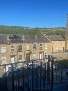 a view from a balcony of a building with a car at Town Centre Penthouse in Halifax +5 photos