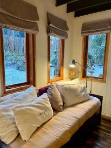 Voodi või voodid majutusasutuse El Bosque 2 Casa en Cerro Otto, Bariloche toas