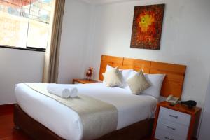 Letto o letti in una camera di Fenix Hotel Machupicchu