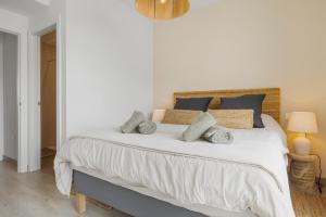 Ένα ή περισσότερα κρεβάτια σε δωμάτιο στο Casa Carmen - Rooftop Luxury Penthouse Estepona +34 φωτογραφίες