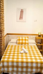 Posteľ alebo postele v izbe v ubytovaní HOSTEL COSTA-LUZ Béjar 28-30