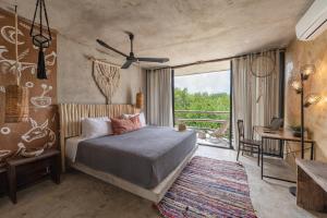 Postel nebo postele na pokoji v ubytování Casa Coyote Tulum