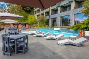 Bazén v ubytování Park Lake Luxury Hotel nebo v jeho okolí