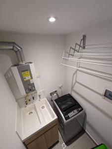 a laboratory with a machine in a room at Nice flat in financial heart of Bogotá in Bogotá