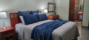Postel nebo postele na pokoji v ubytování Stroopsoet Holiday Home