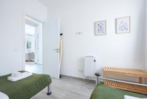 Postel nebo postele na pokoji v ubytování Sintra Sweet Apartment II - Free Parking + 26 fotografií