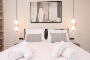Postel nebo postele na pokoji v ubytování Olive Luxury Suite