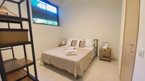 Postel nebo postele na pokoji v ubytování Urban Suites - B&B