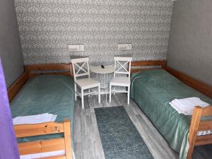 Postel nebo postele na pokoji v ubytování Beach House Ystad