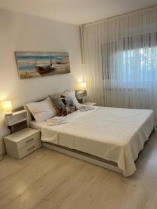 Ένα ή περισσότερα κρεβάτια σε δωμάτιο στο Tei-Zi apartments2