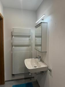 Koupelna v ubytování Gemütliche Wohnung + 2 fotografie