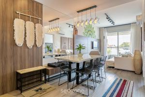 Khu vực ghế ngồi tại Apto no cond Thai Beach Home Spa frente mar TBS106
