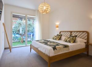 Ένα ή περισσότερα κρεβάτια σε δωμάτιο στο La Sfiora - Appartamenti