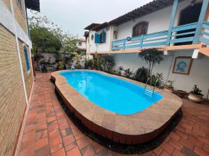 A piscina localizada em Aloha Hostel CF ou nos arredores