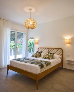 Ένα ή περισσότερα κρεβάτια σε δωμάτιο στο La Sfiora - Appartamenti