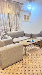 Χώρος καθιστικού στο Quel Serviced Units