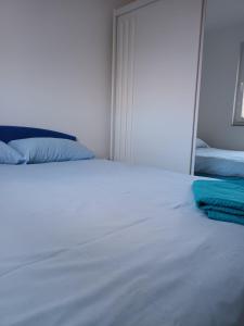 Ένα ή περισσότερα κρεβάτια σε δωμάτιο στο Apartman Sunce