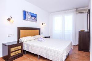 Posteľ alebo postele v izbe v ubytovaní Las vistas Piso
