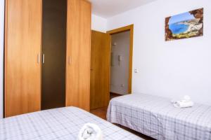 Posteľ alebo postele v izbe v ubytovaní Las vistas Piso