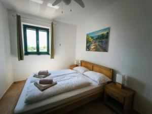 Postel nebo postele na pokoji v ubytování Villa Mikulica + 22 fotografií
