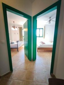 Postel nebo postele na pokoji v ubytování Villa Mikulica
