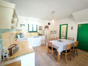 Kuchyň nebo kuchyňský kout v ubytování Villa Mikulica