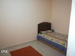 a small bedroom with a bed in a room at مرسي مطروح in Marsa Matruh +1 photo