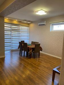 a dining room with a table and chairs at Summer house nearCaspian sea Fatmai, Baku Дачный дом на берегу моря, Фатмаи, Баку in Baku