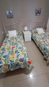 Posteľ alebo postele v izbe v ubytovaní Apartamento Candelaria vivienda vacacional