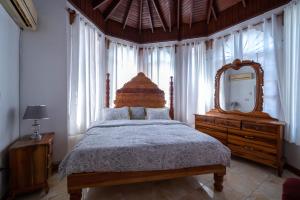 Ένα ή περισσότερα κρεβάτια σε δωμάτιο στο Timar Sunset 2 Bedroom Suite +20 φωτογραφίες