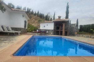 The swimming pool at or close to Holiday Home in Canillas near Beach