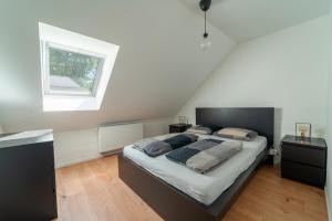 Postel nebo postele na pokoji v ubytování vakantie-hengelhoef