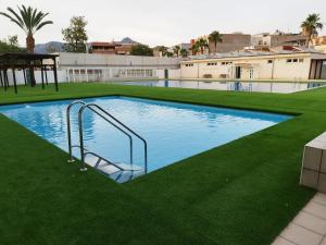 Swimmingpoolen hos eller tæt på Apartamentos Elegancia