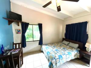 Postel nebo postele na pokoji v ubytování Casitas de la Paz