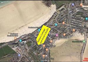 a map of a beach with a yellow rectangle at Cornish Cottage in Downalong, St Ives in St Ives