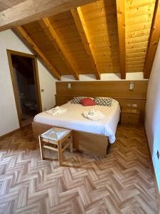 Postel nebo postele na pokoji v ubytování Hotel Belfort + 19 fotografií